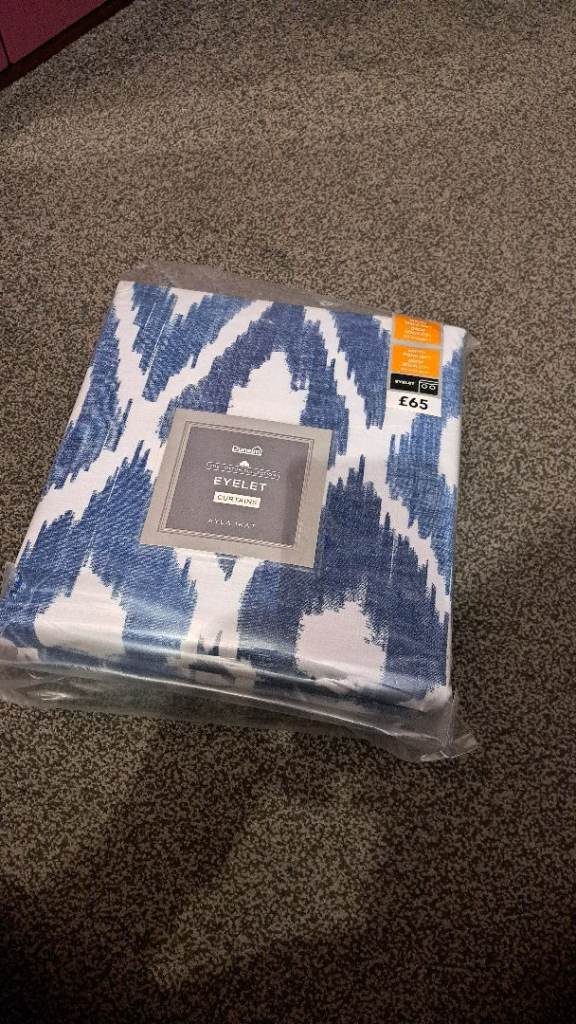 Blue and white eyelet curtains 