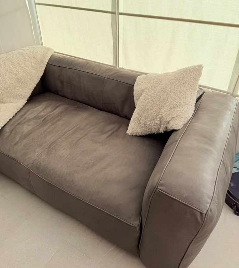 High end distressed hide deep squishy sofa