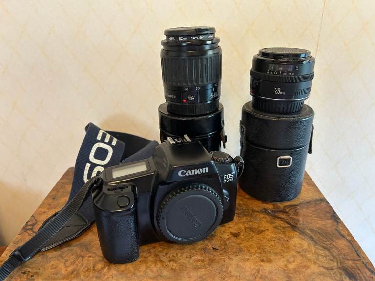 image for Cannon EOS 1000F 35mm SLR + Cannon 35-85mm lens + 28mm lens + leather cases