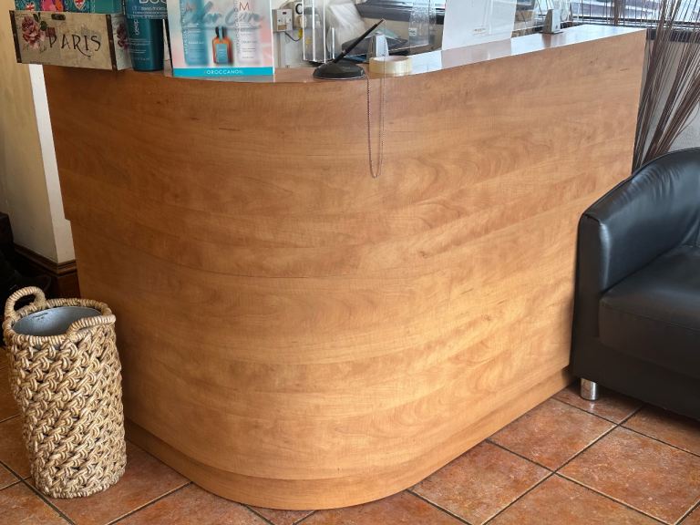 reception desk with till drawer and two cupboards