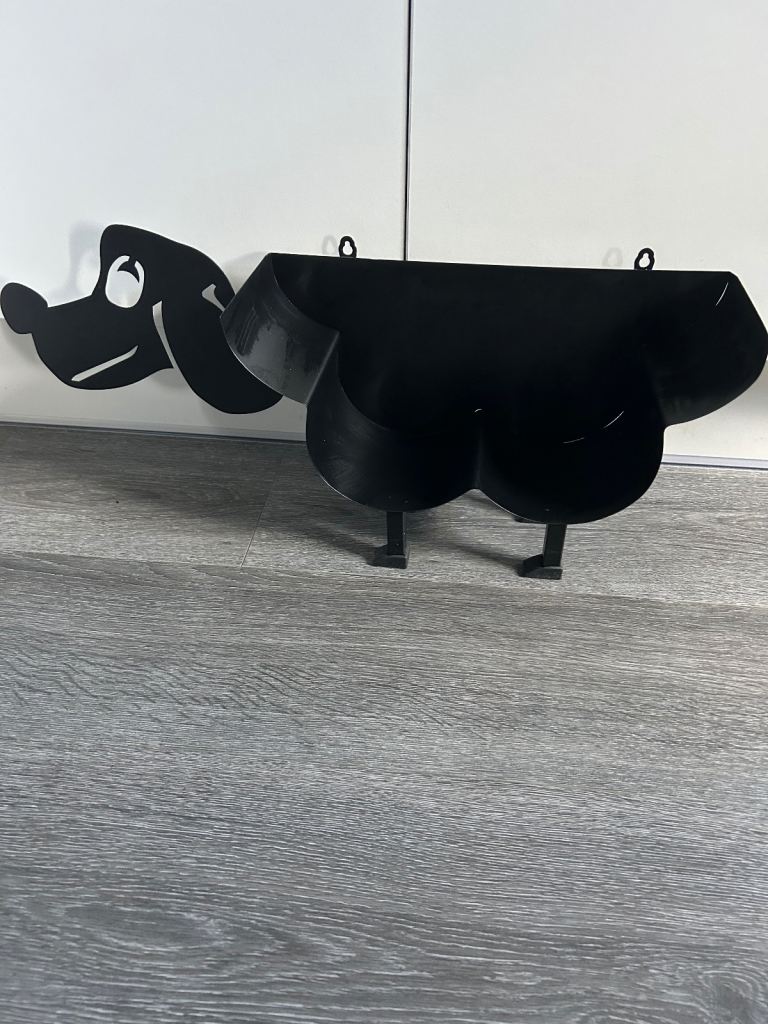 Dog toilet roll holder 