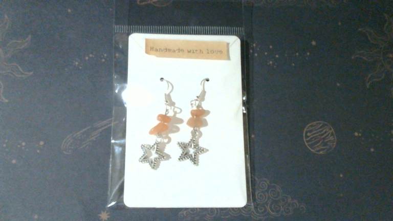 silver plated orange adventurine star earrings 