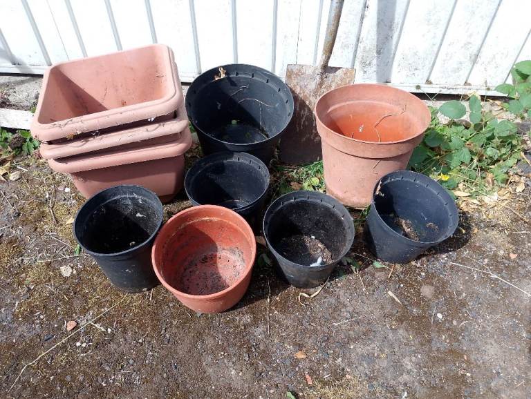 11 large Plastic Plant Pots new and used