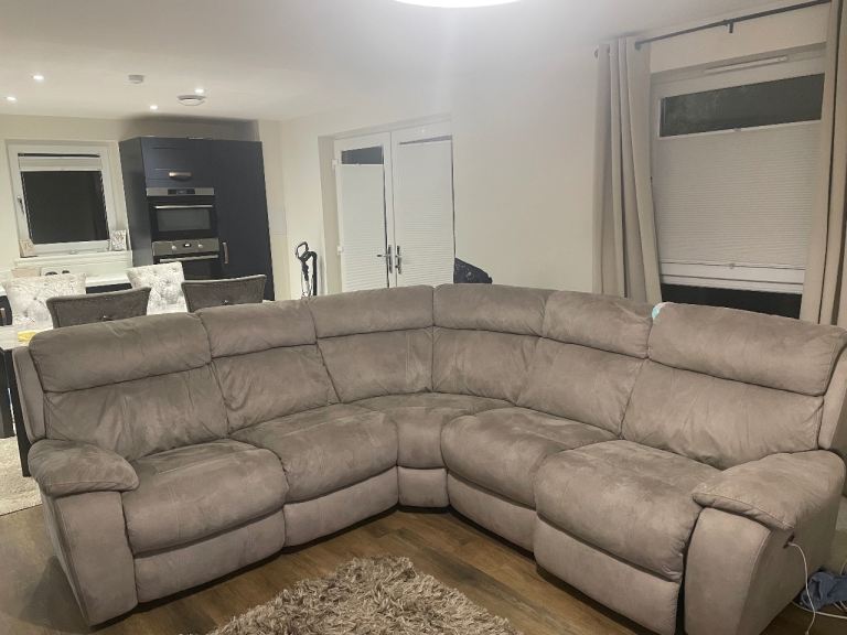 Grey sofa with 2 recliners 