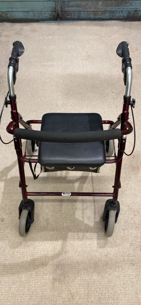 Burgundy Mobility Walker with Seat and Storage – Good Condition