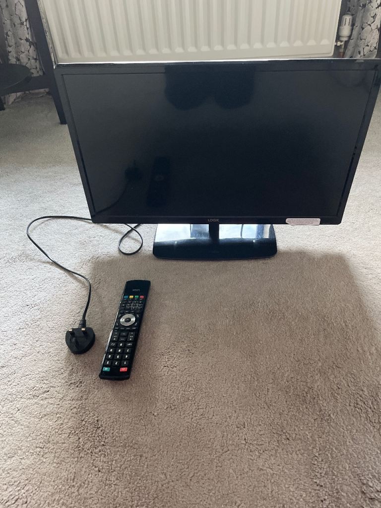 Black LCD TV with Remote Control – Good Condition