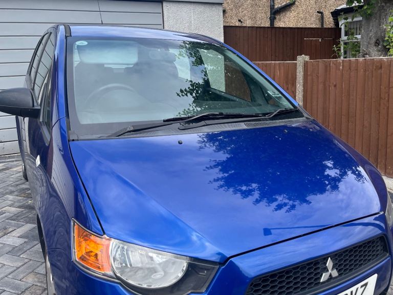 Blue Mitsubishi Colt Cz1.  1.1