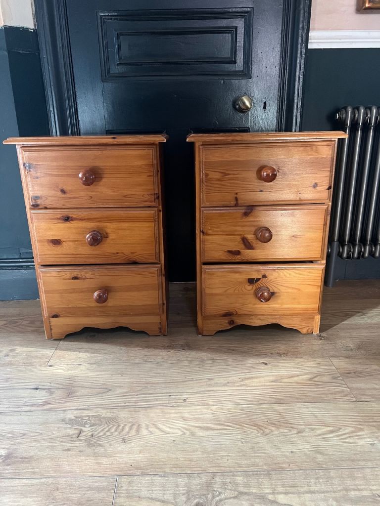 image for Two solid pine 3 drawer bedside cabinets