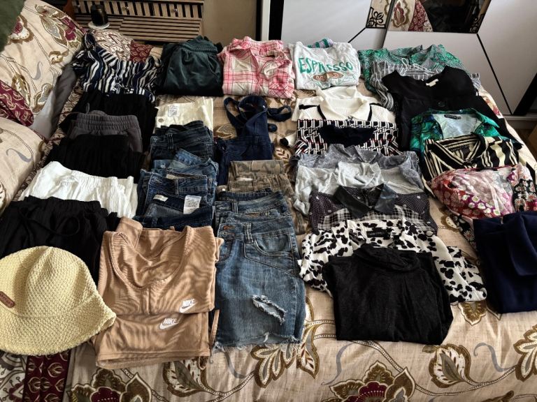 Large Bundle of Women's Clothing - Jeans, Tops, and Skirts