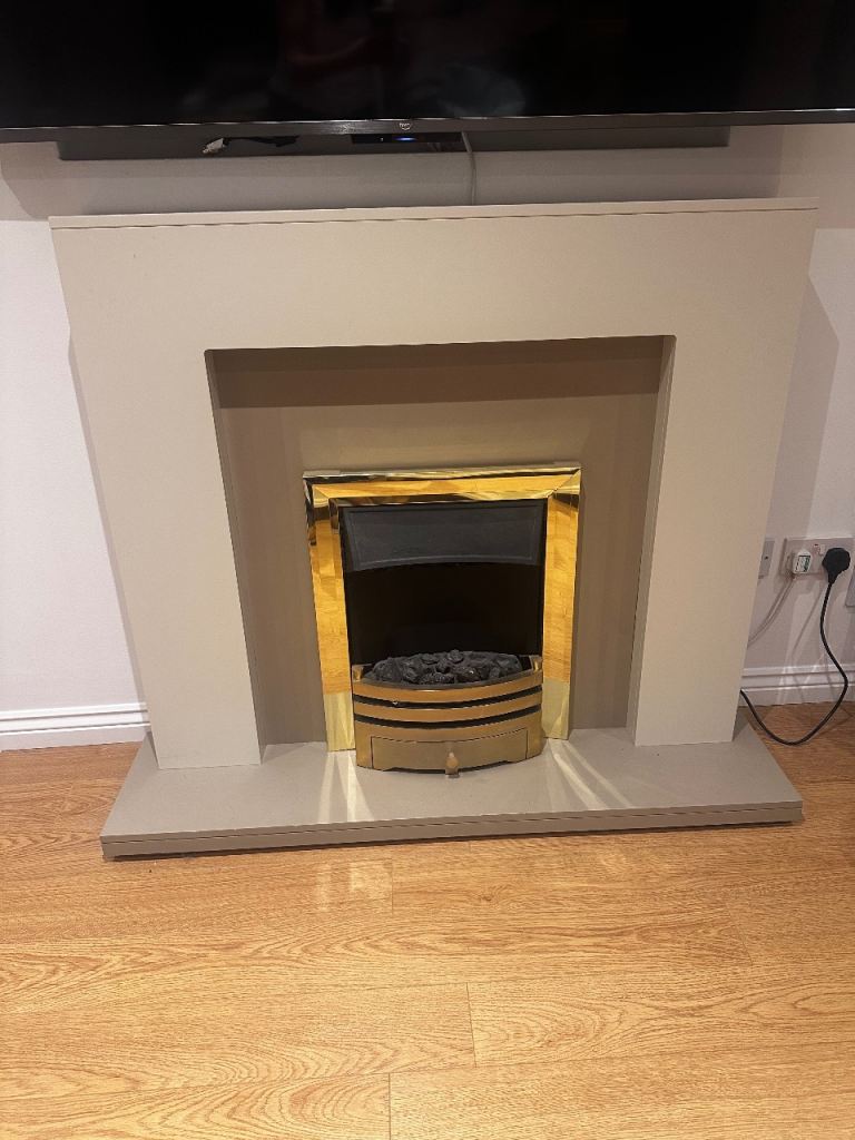 Fireplace with electric fire