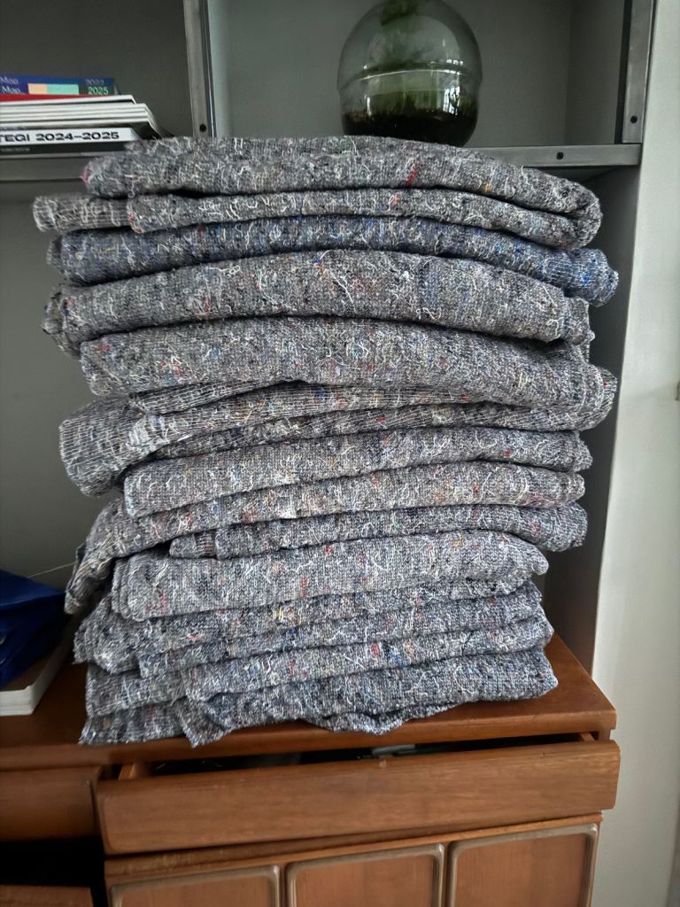 Packing blankets + moving boxes