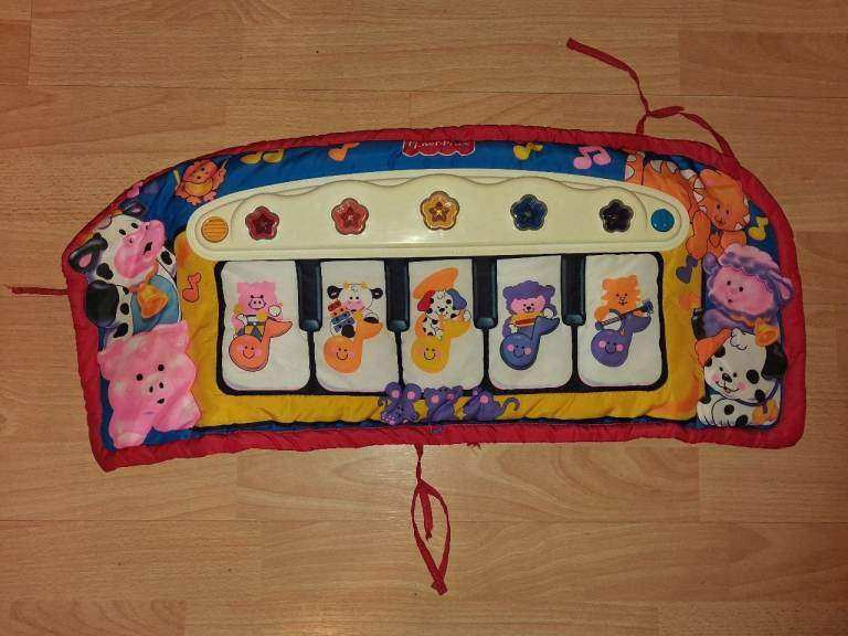 Fisher Price musical piano toy for inside or outside cot
