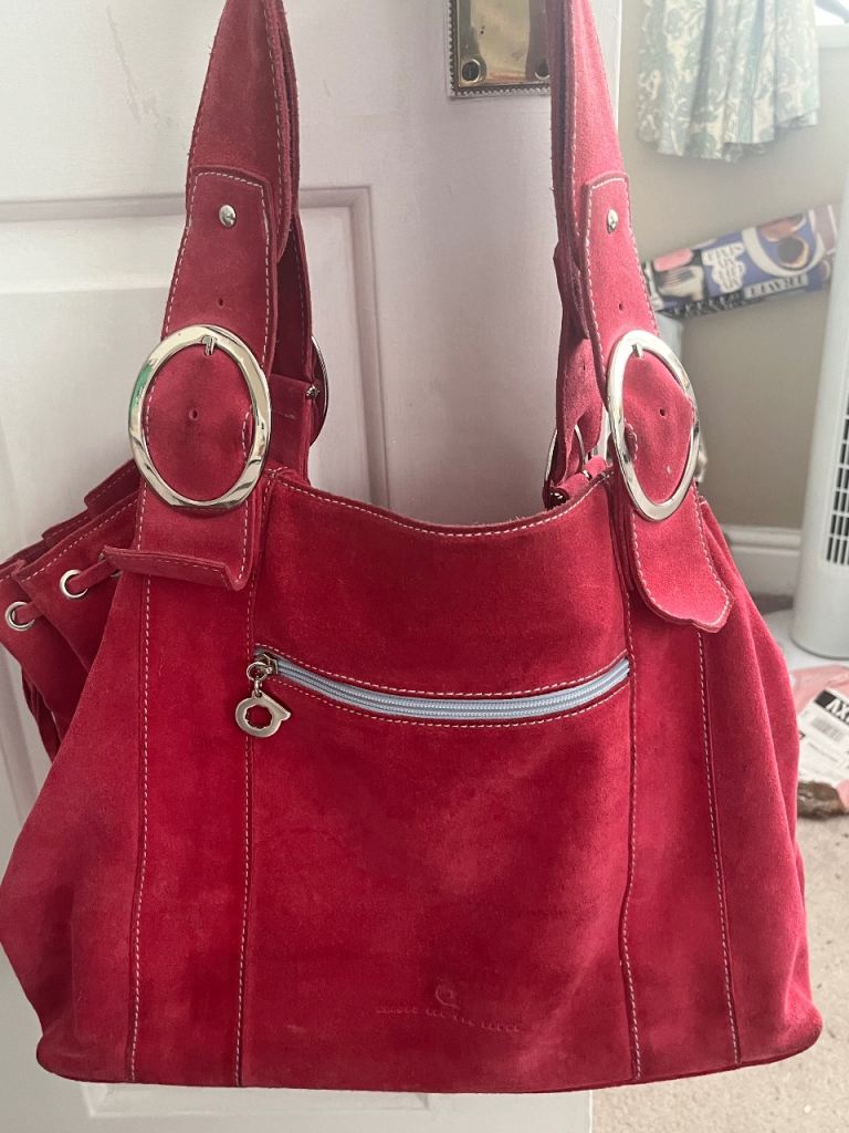 Allison van der Lande fuscia suede handbag
