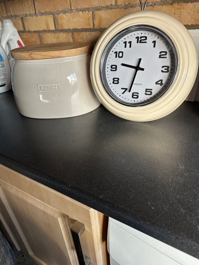 NEXT Ceramic bread bin and a kitchen clock 
