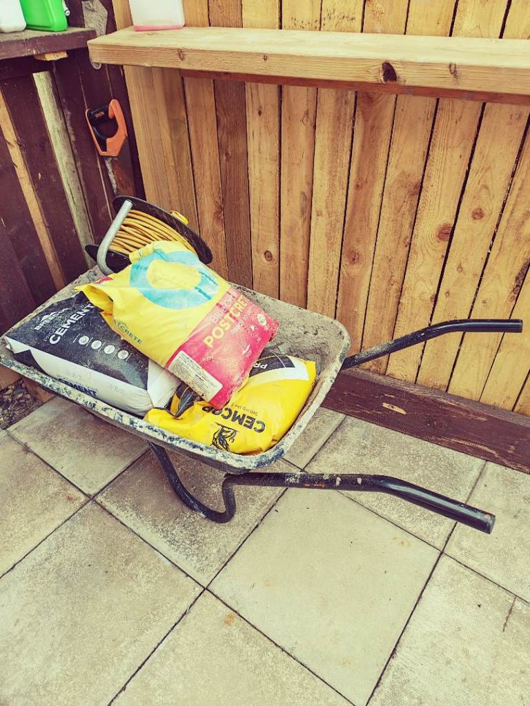 Wheel barrow and cement 