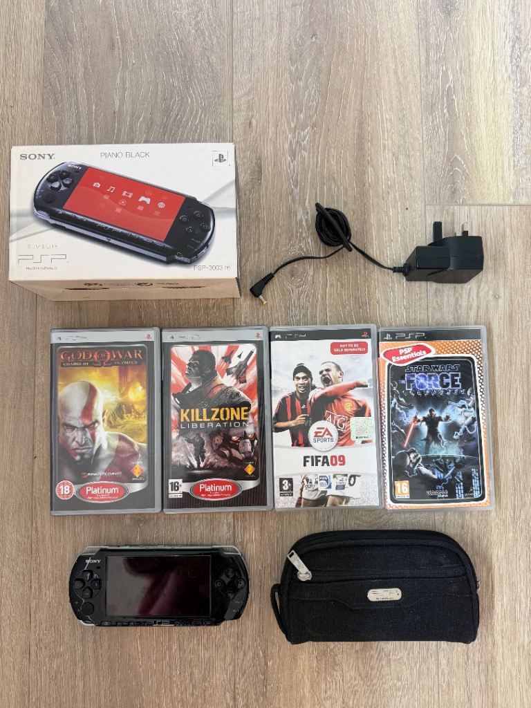 Sony PSP Slim & Lite + 4 games
