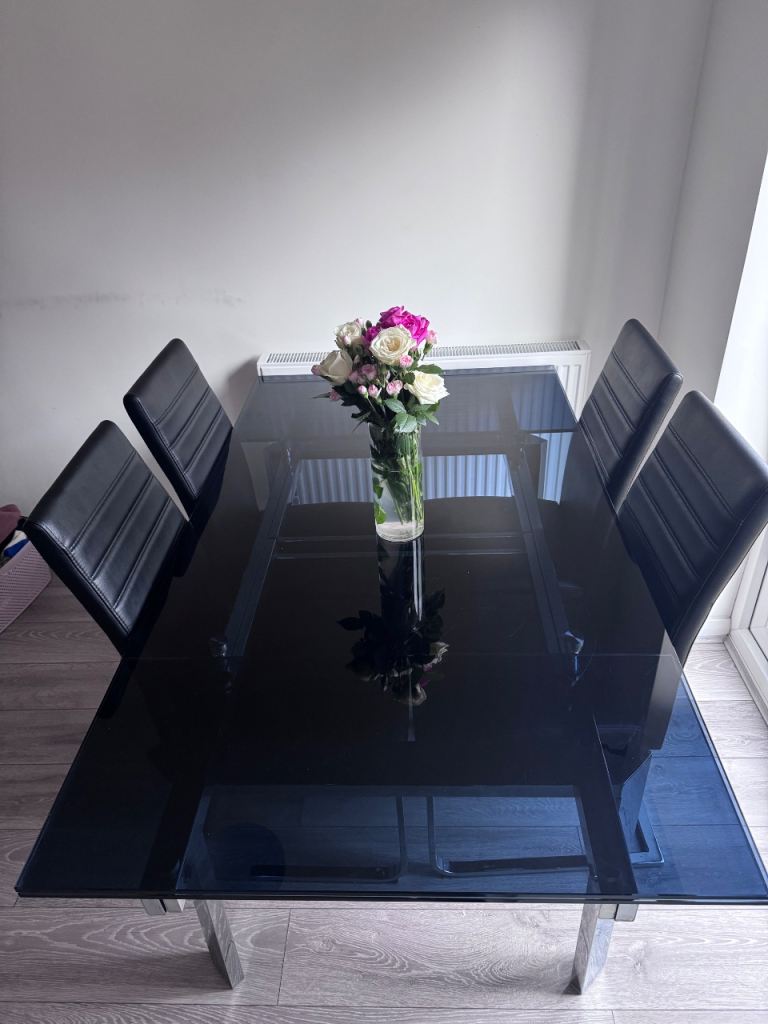 8 seater black glass dining table 