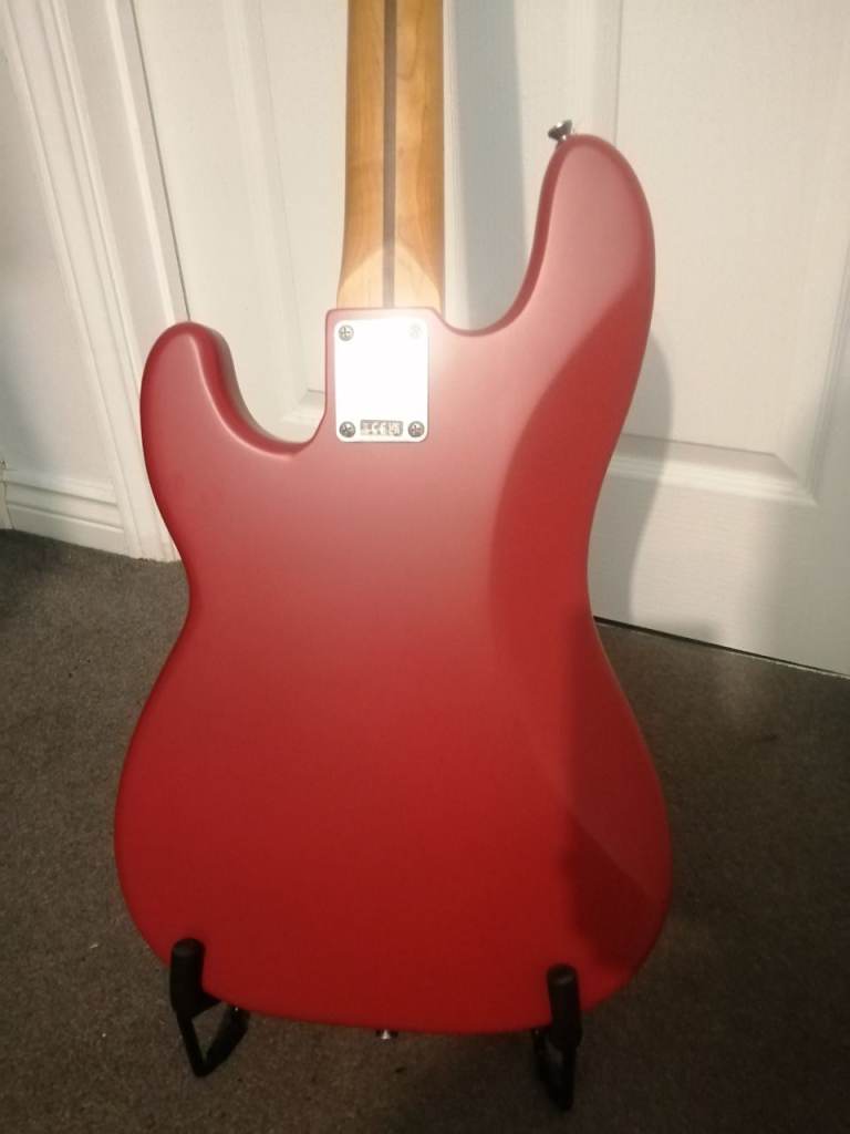 Squier 40th precision bass in red and gold