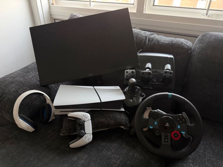 PS5 Console with Controller, Headset, Monitor, and Logitech G29 Wheel