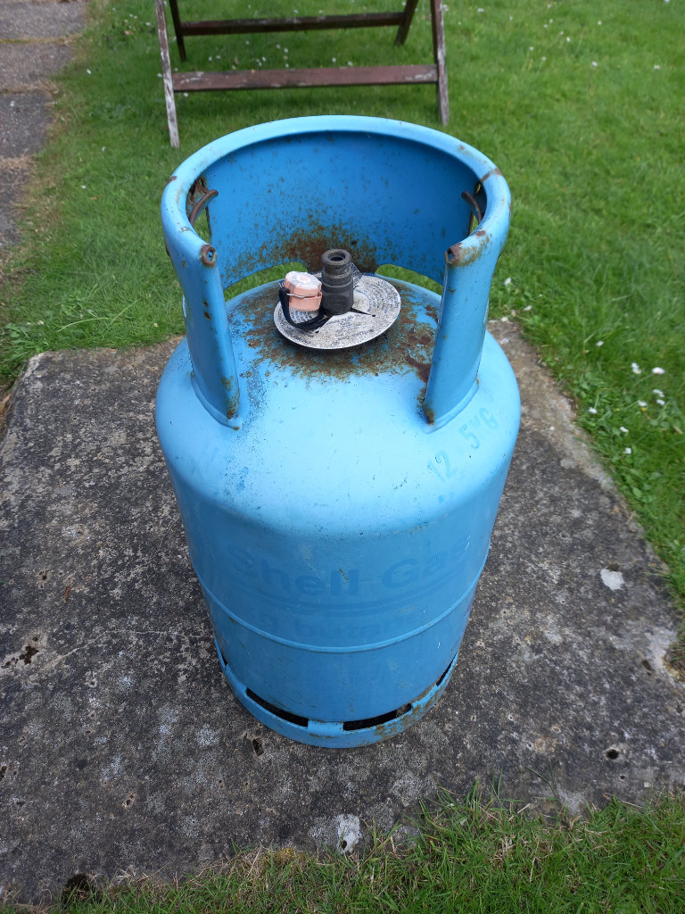 Butane medium size gas cylinder.  