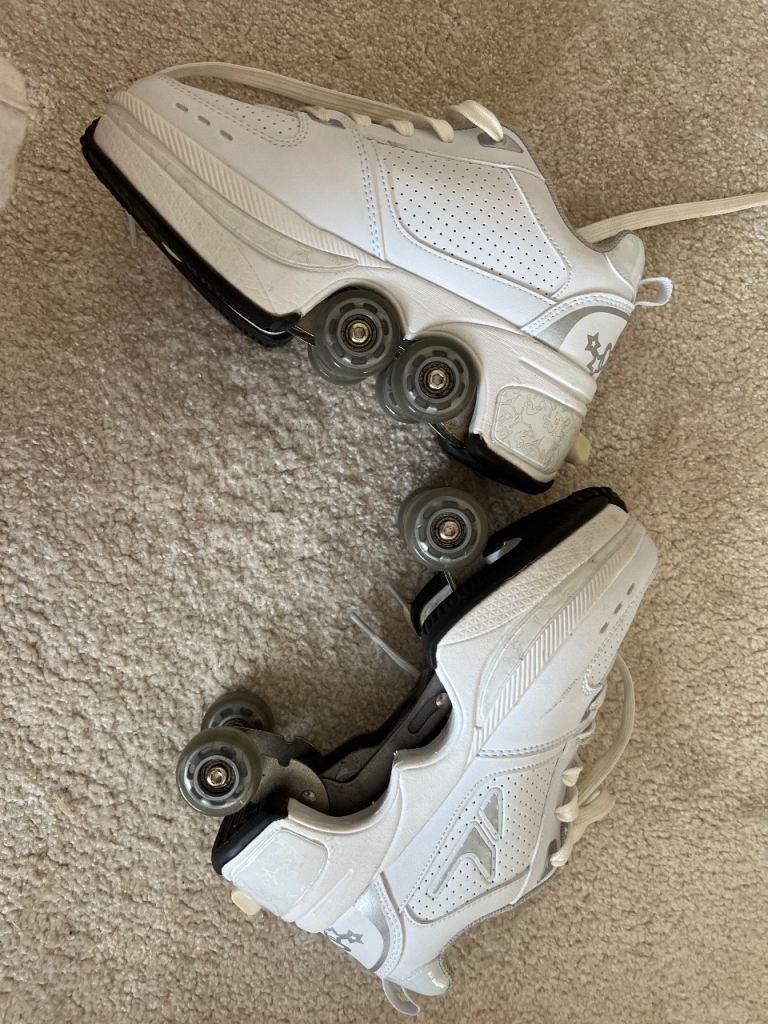 White trainers convert to Roller Skates using button on back to release retractable wheels