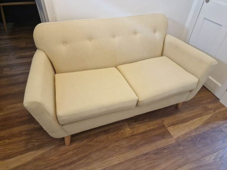 Pale yellow Two-Seater Sofa – Good Condition
