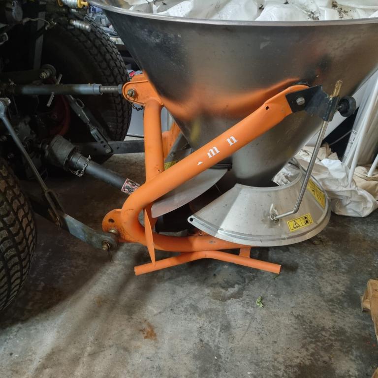 Tractor mounted salt spreader bucket