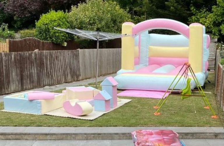Pastel multicoloured bouncy castle and soft play 