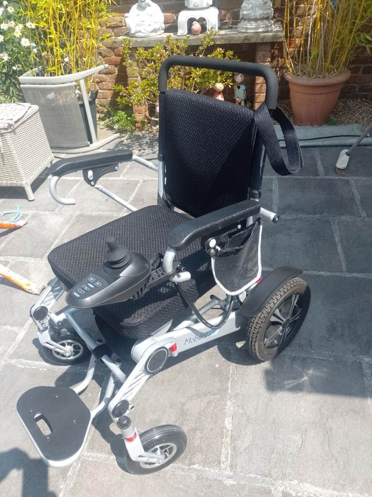 Mobility Plus Instant fold power wheel chair 