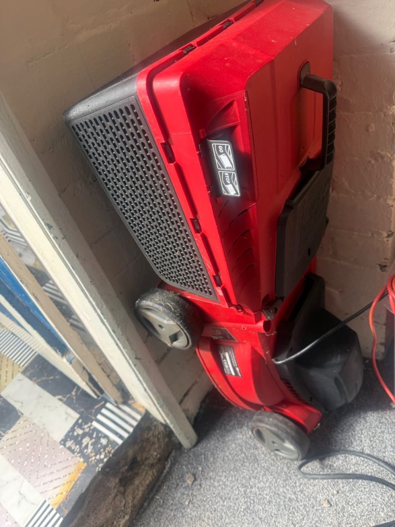 Red Electric grass machine Good Condition
