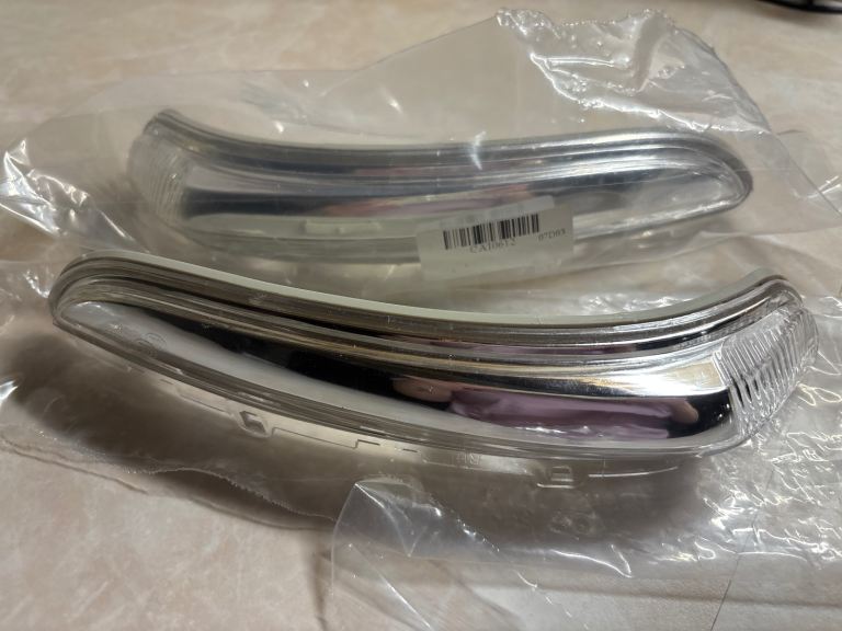 Wingmirror light housing pair