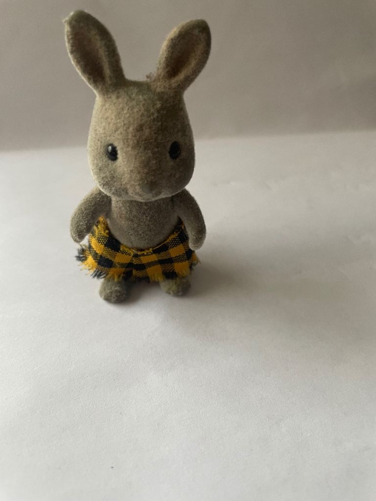 Cute Flocked Rabbit Figure with Plaid Shorts – Good Condition