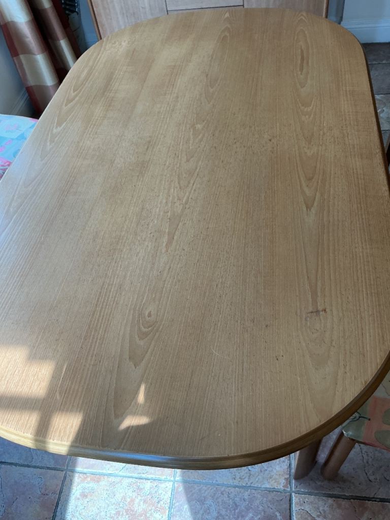 Oak veneer oval dining table and 3 chairs