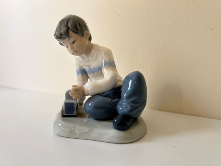 Ceramic Boy Figurine nao Playing with Toy Car – Good Condition