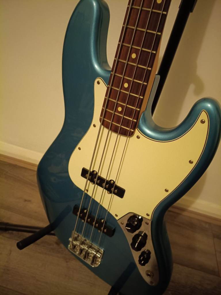 Fender Jazz bass in Lake Placid blue with Fender hard case, pickup upgrade