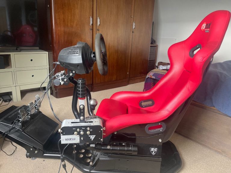 Racing Simulator Cockpit with Steering Wheel, Pedals, and Shifter