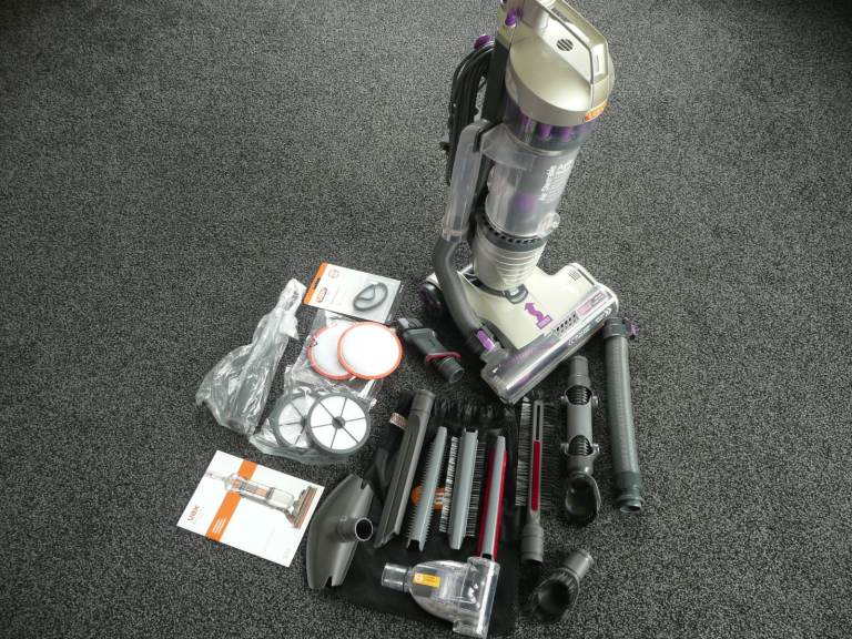 VAX Air Steerable Agile Hoover with Pet brush and additional tools, instructions and spare filters.