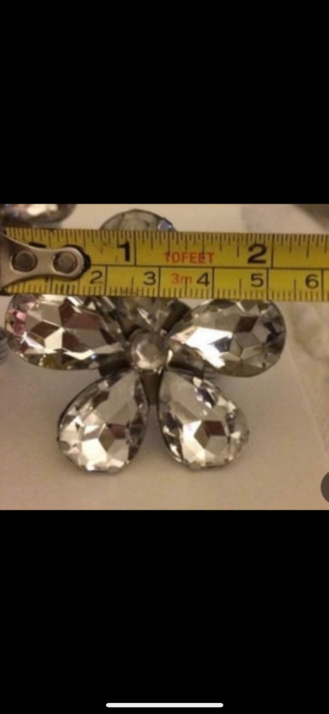 Napkin rings 2 sets separate (7) & 8 silver faux diamanté petal shape 