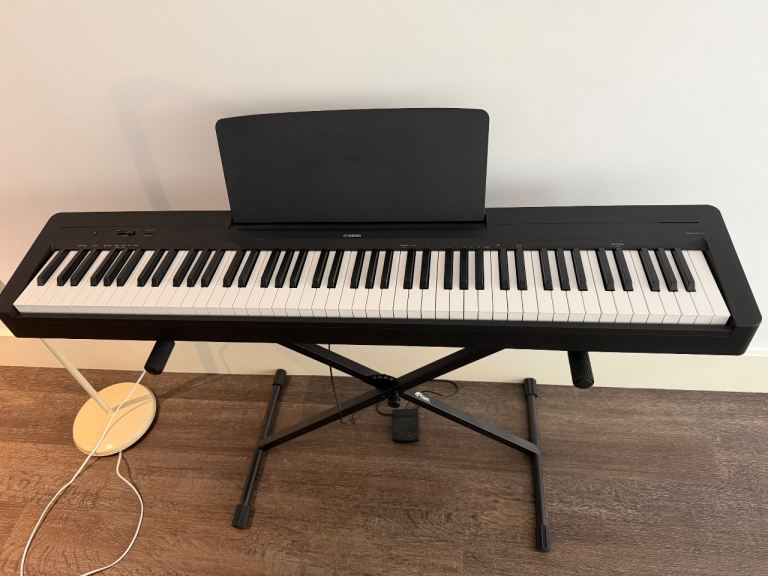 	Yamaha piano with stand and pedal – excellent condition