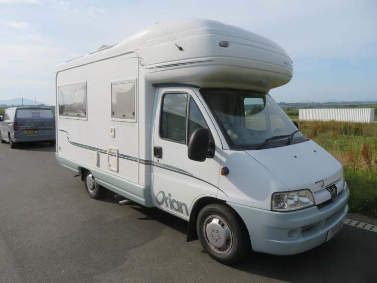 Auto Sleeper Orion Dorado