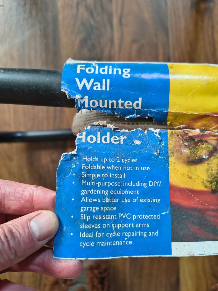 Folding wall mounted bike holder