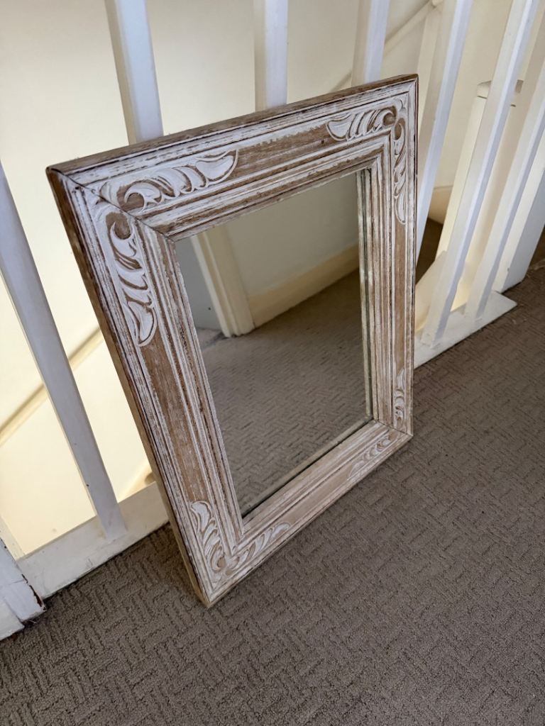 Vintage mirror with wooden frame  