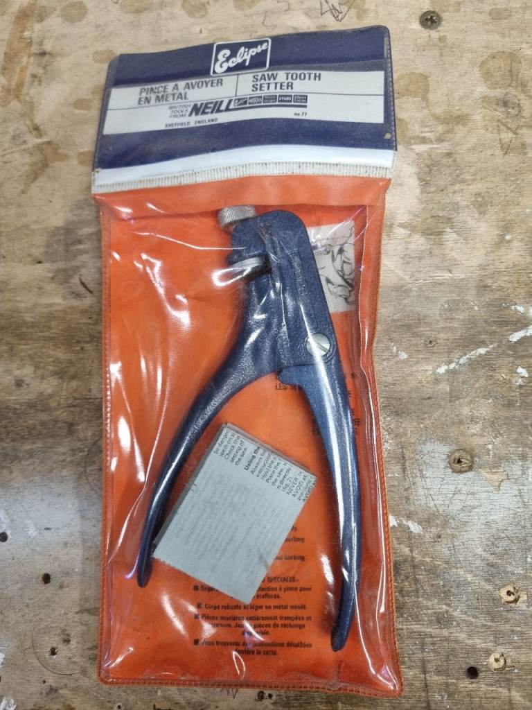 Saw sharpener and tooth setting tool