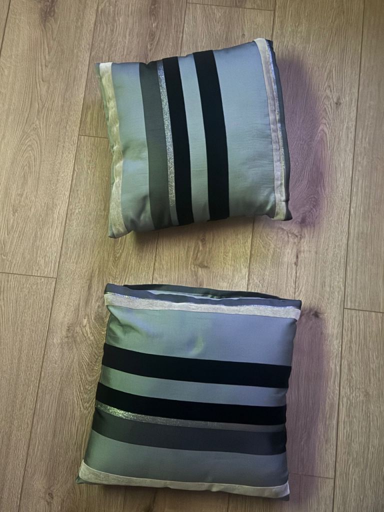 Pair of black and grey striped cushions