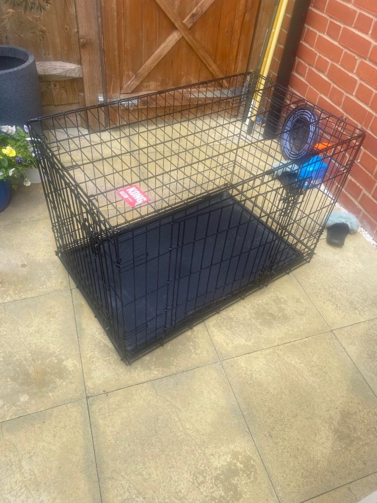 Hardly used dog cage 