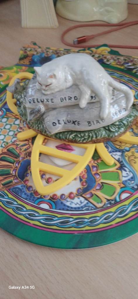 Cute Vintage White Ceramic Cat Figure on 'Deluxe Bird Seed' Bags free delivery 