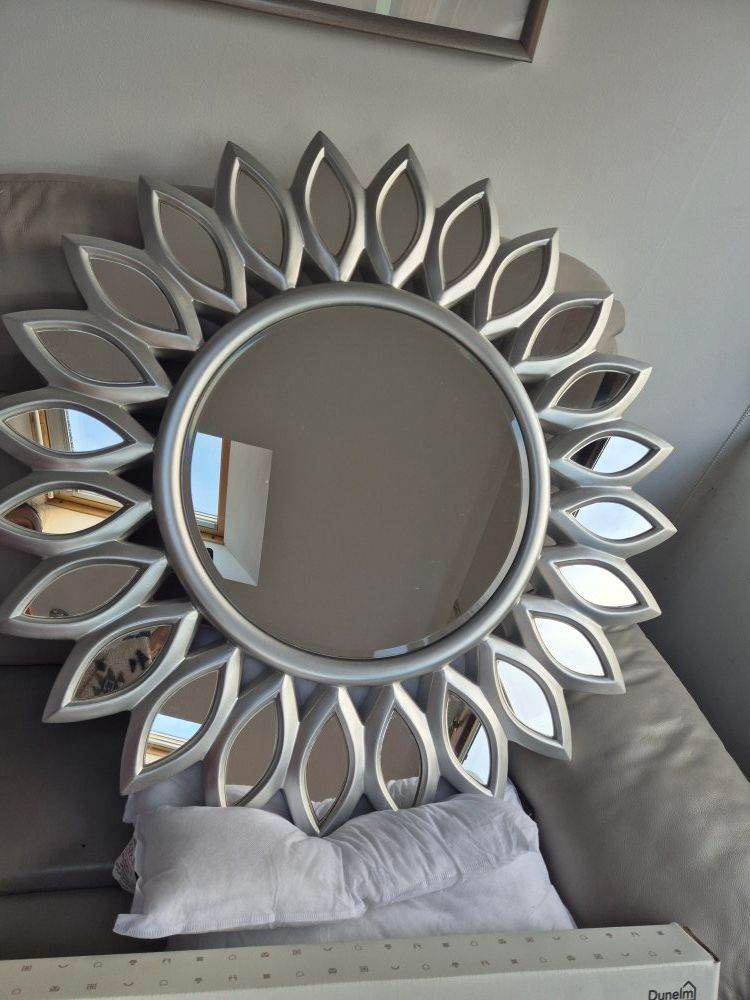 Large silver sunburst wall mirror
