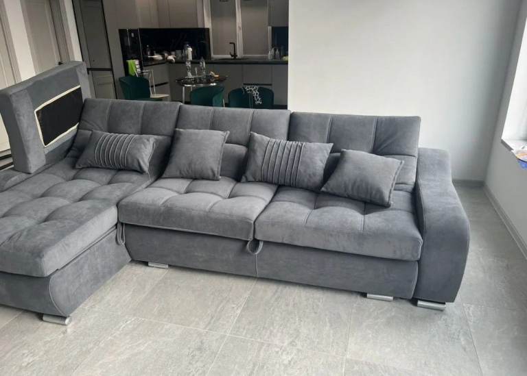 Corner modular sofa with fold-out design