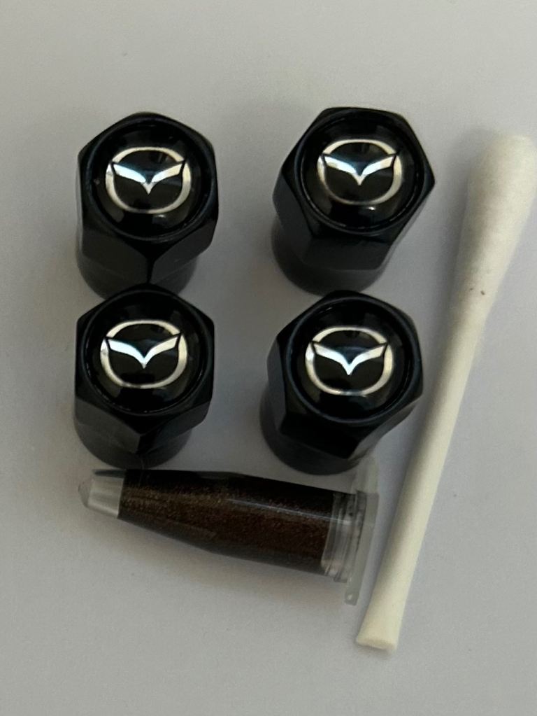 Mazda Tyre valve caps with grease 