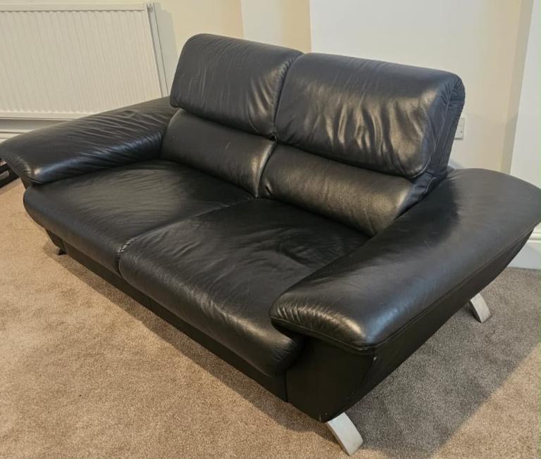 Black Leather Two-Seater Sofa – Good Condition